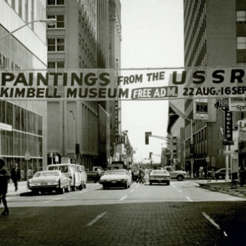 a banner in downtown Fort Worth advertising the Impressionist and Post-Impressionist Paintings from the USSR exhibition